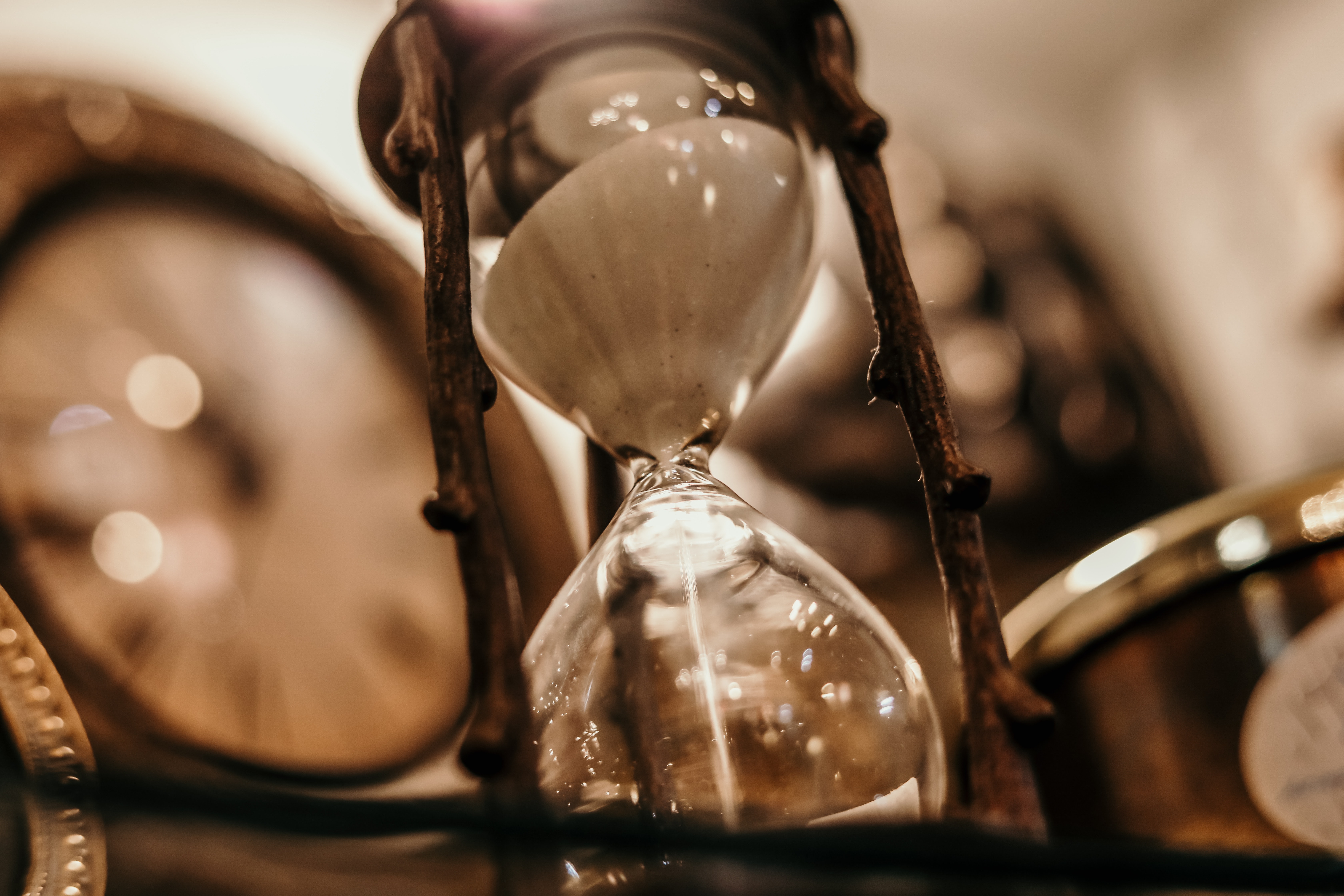 shallow-focus-photography-of-hourglass-1095602